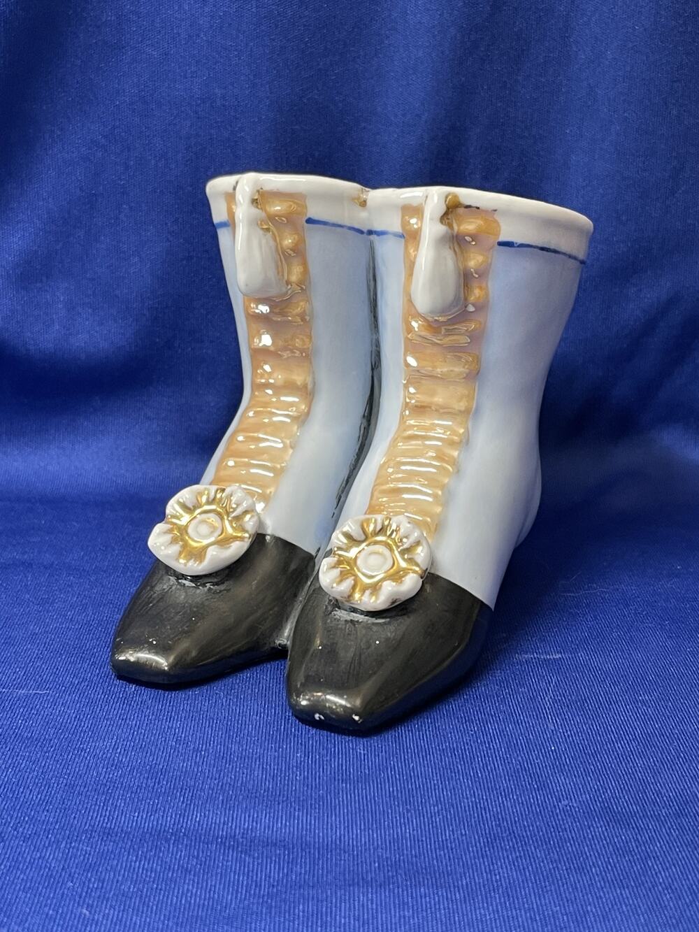 Vintage Porcelain Figurine of Ladies Boots Match Holder with Striker